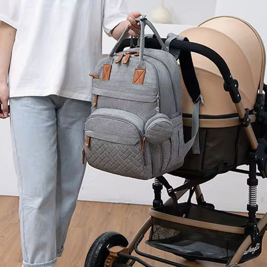 sac à dos à langer accrocher à la poussette