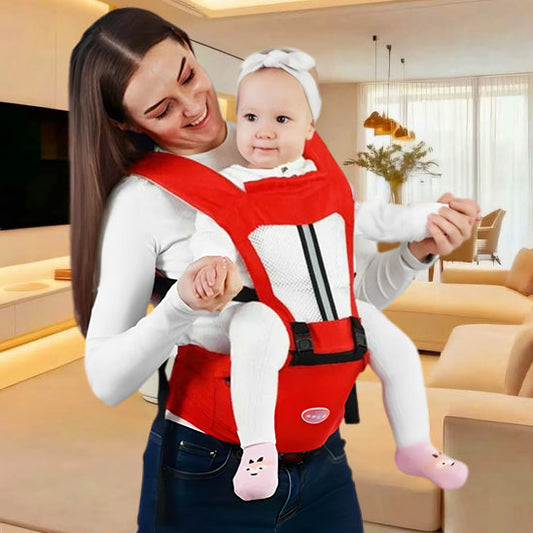 une mère souriante grâce à porte bebe 
