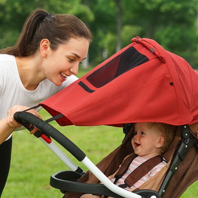 bébé sous un Par soleil pour poussette​ 