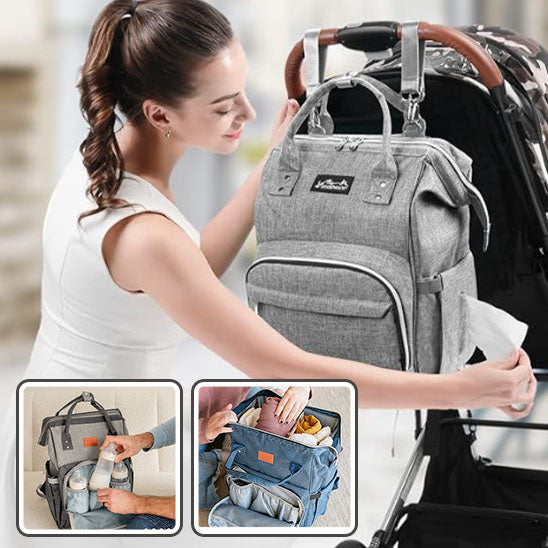 maman range les affaires dans sac a dos a langer